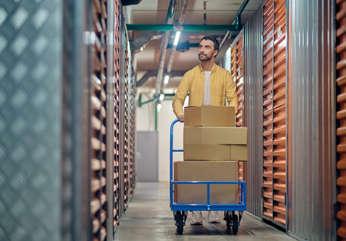 Man moving into a storage unit