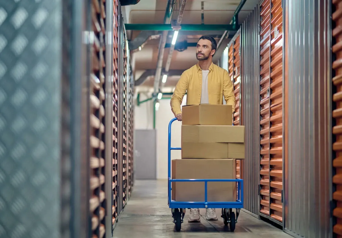 Man moving into a storage unit
